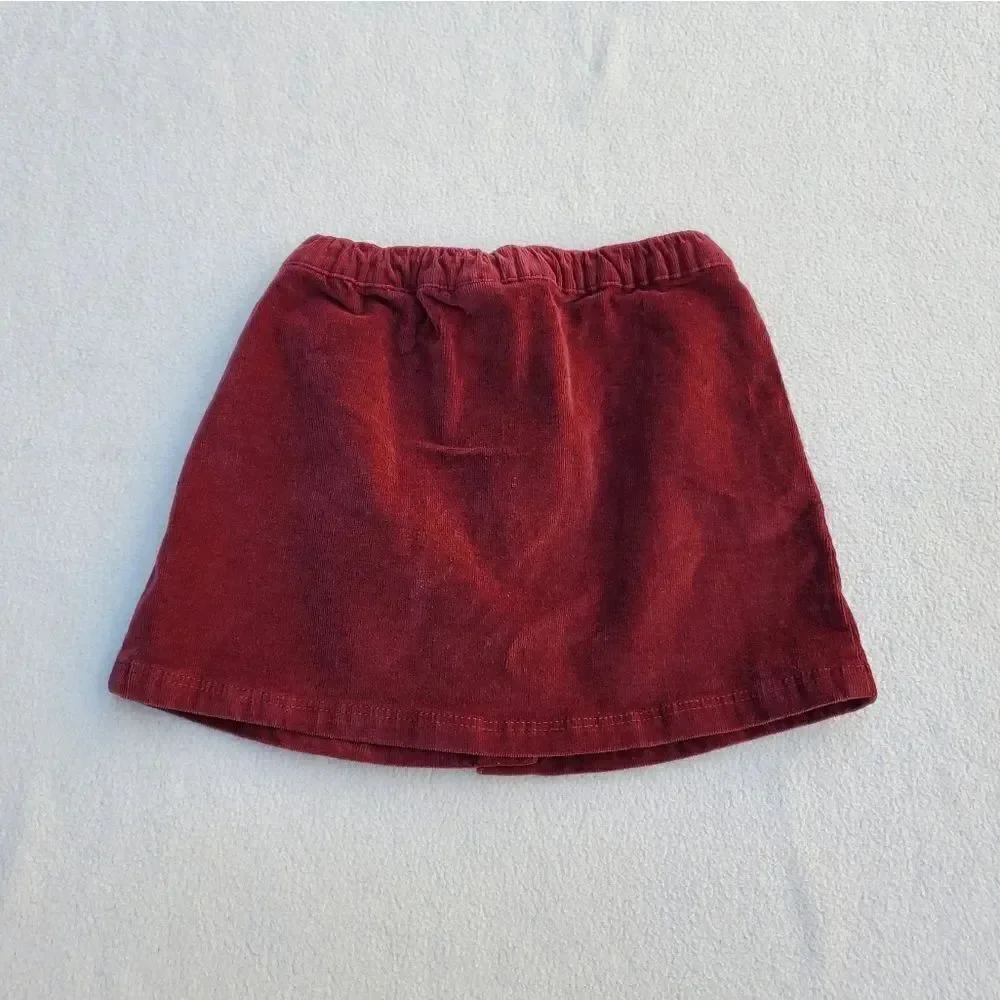 Girls 2 tops and skirt bundle Size 4-5